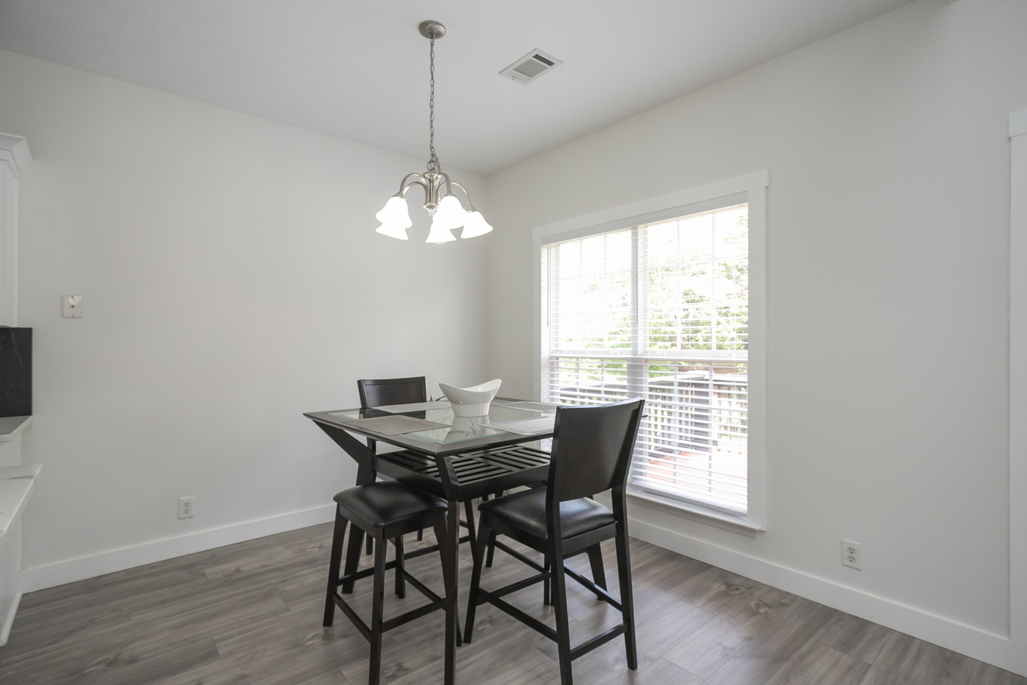 7337 Campton Road Nashville, TN 37211 - Photo 22 of 53 a view of a dining room with furniture window and wooden floor