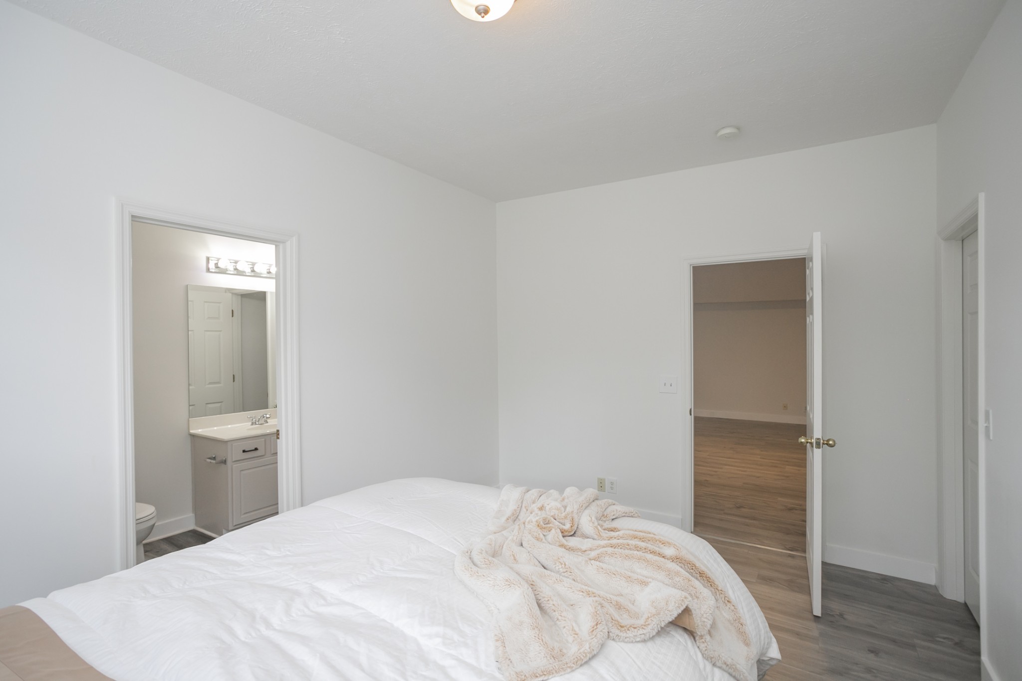 7337 Campton Road Nashville, TN 37211 - Photo 40 of 53 a bedroom with a bed and a table