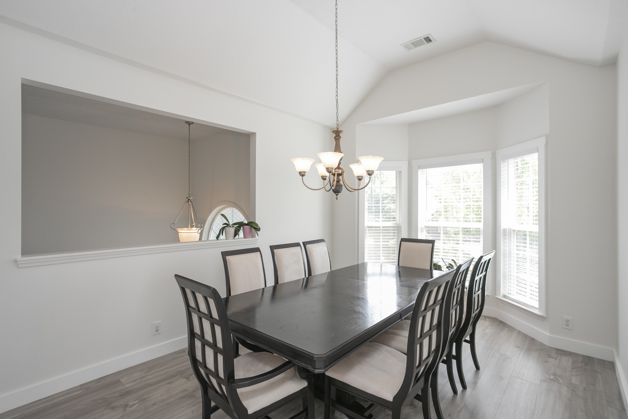 7337 Campton Road Nashville, TN 37211 - Photo 5 of 53 a view of a dining room with furniture a chandelier and wooden floor
