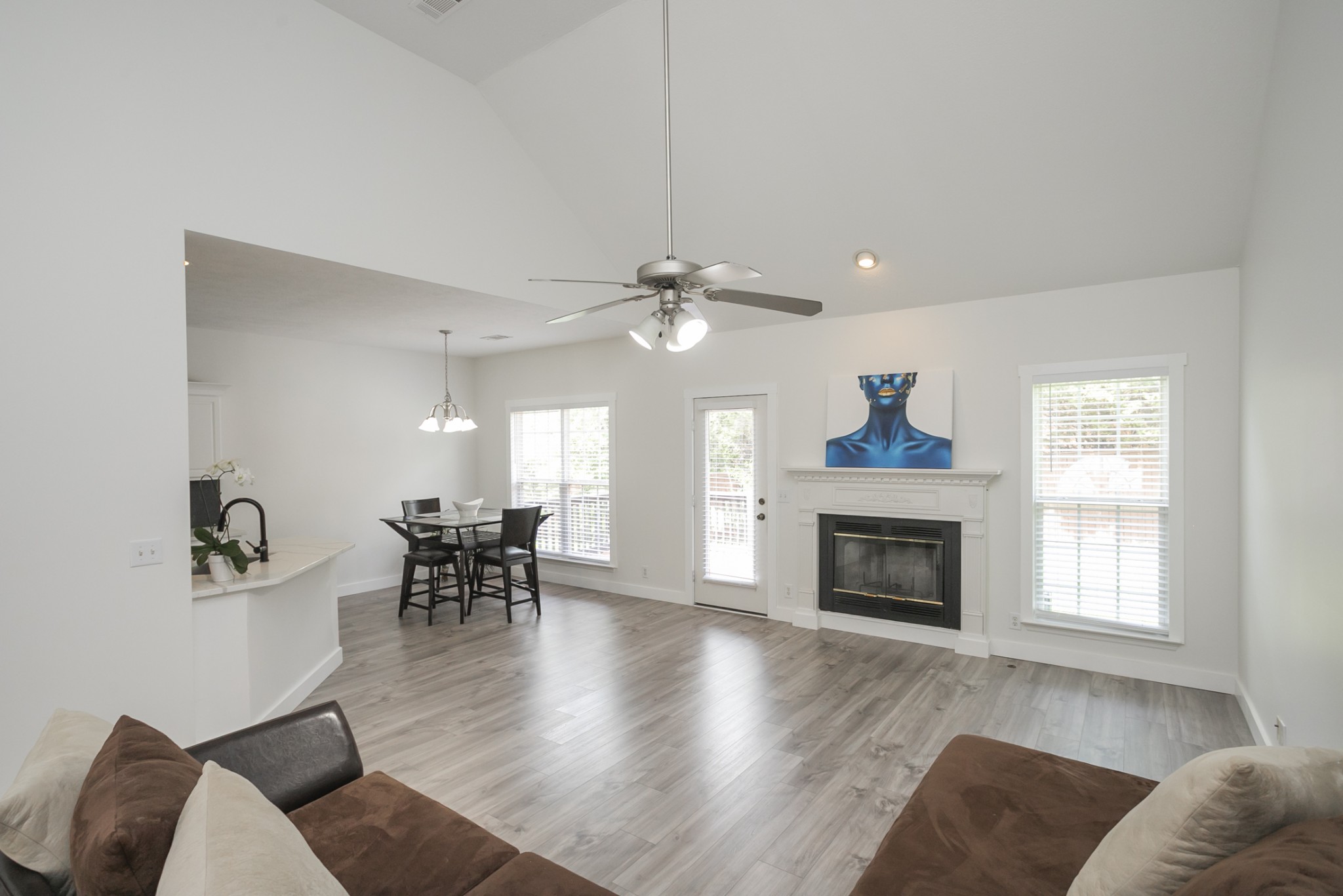 7337 Campton Road Nashville, TN 37211 - Photo 7 of 53 a living room with furniture a fireplace and a window