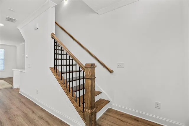 a view of entryway with wooden floor