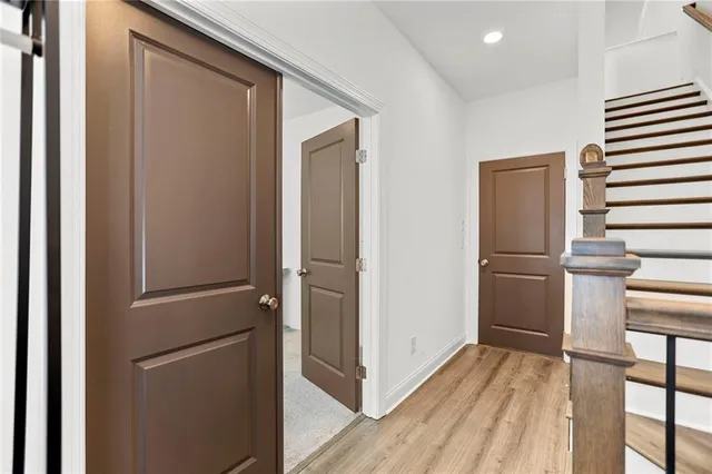 a view of kitchen with furniture and refrigerator