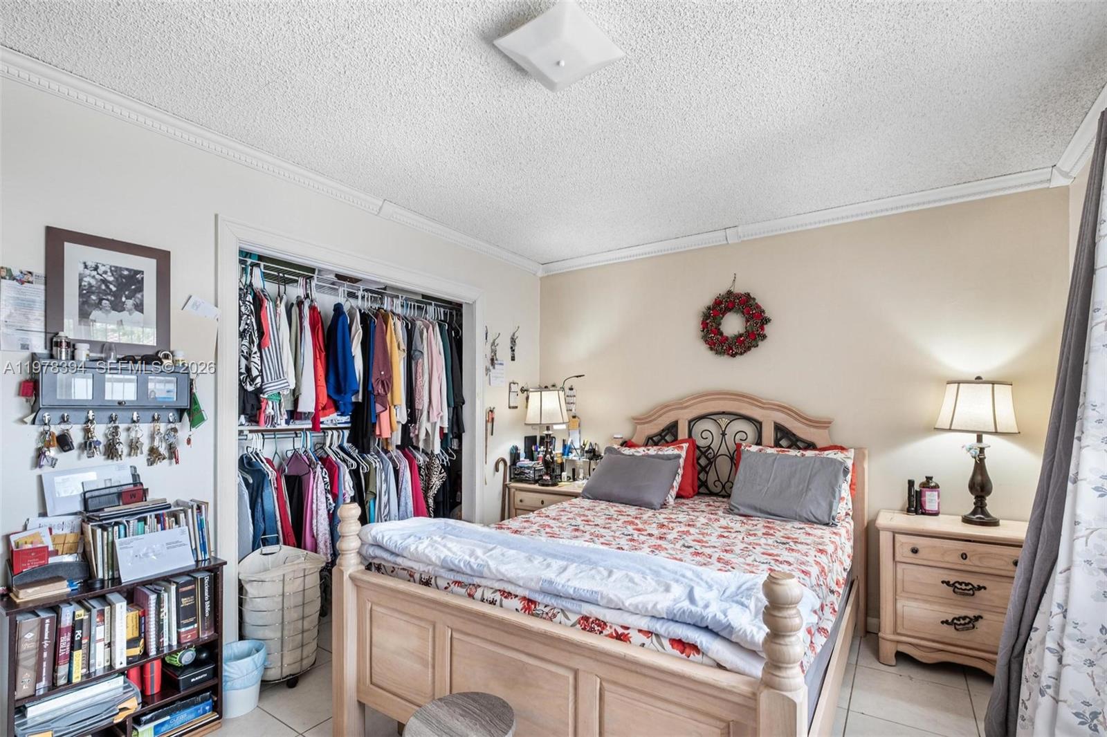 2862 Southwest 38th Court Miami, FL 33134 - Photo 25 of 67 a bedroom with a bed and a large closet
