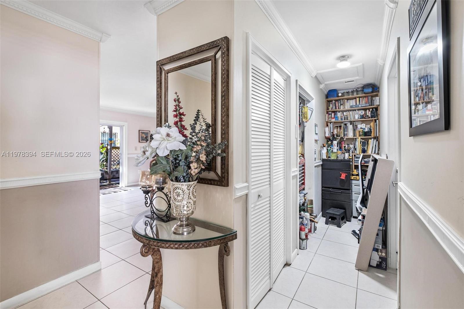 2862 Southwest 38th Court Miami, FL 33134 - Photo 29 of 67 a view of a hallway with workspace and living room