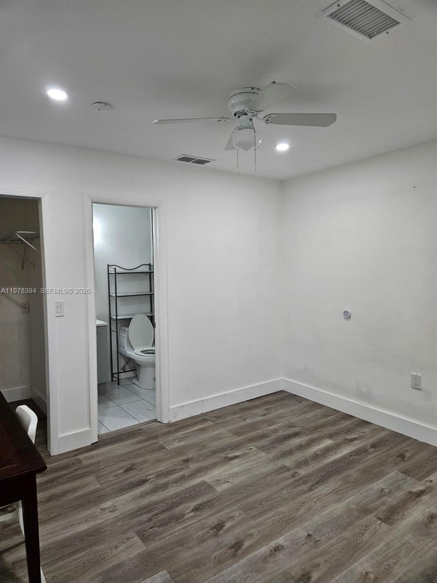 2862 Southwest 38th Court Miami, FL 33134 - Photo 48 of 67 a view of a room and wooden floor