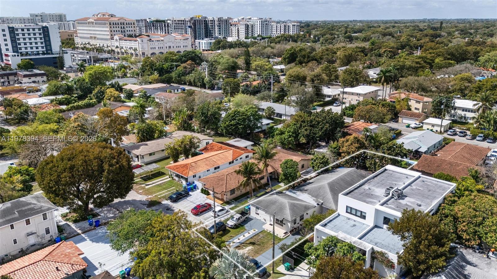 2862 Southwest 38th Court Miami, FL 33134 - Photo 61 of 67 an aerial view of a city with lots of residential buildings