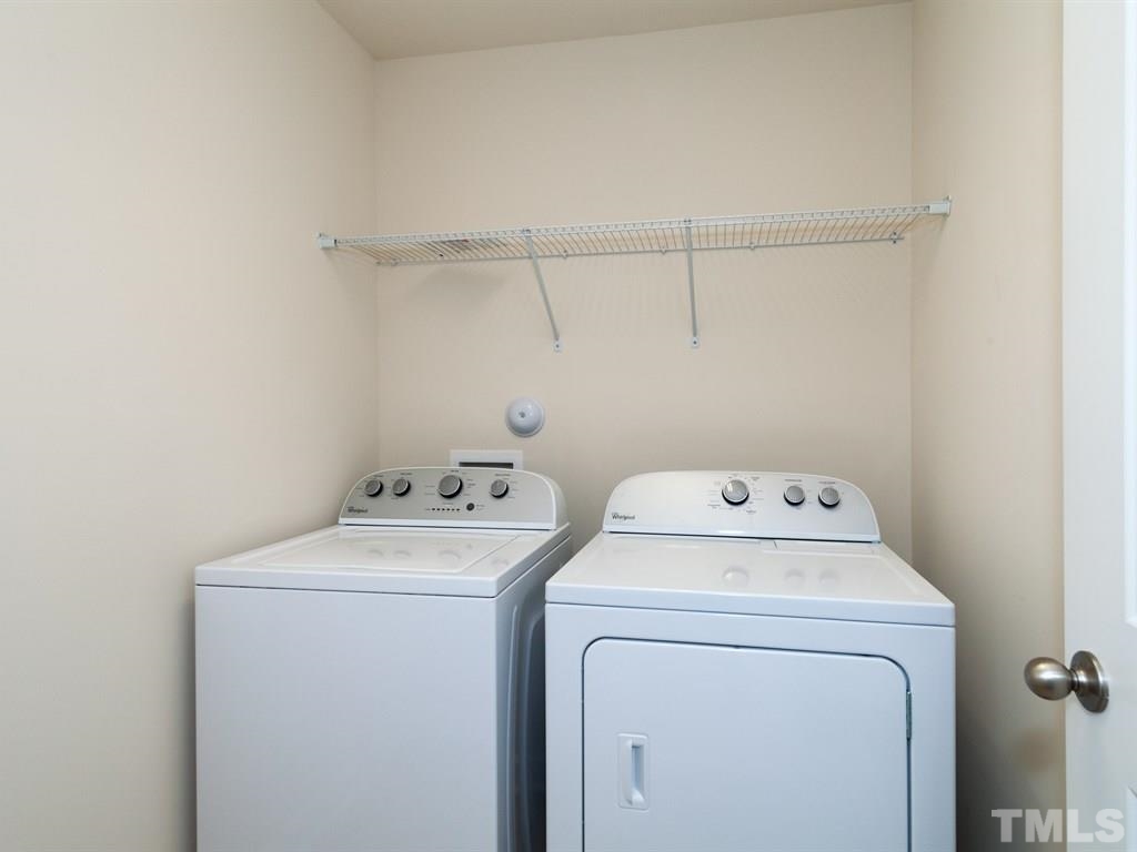 2424 Pecan Ridge Way Apex, NC 27502 - Photo 14 of 21 A walk-in Laundry room on the second floor of this spacious townhom. Not actual Home. Pictures are of same floorplan in community