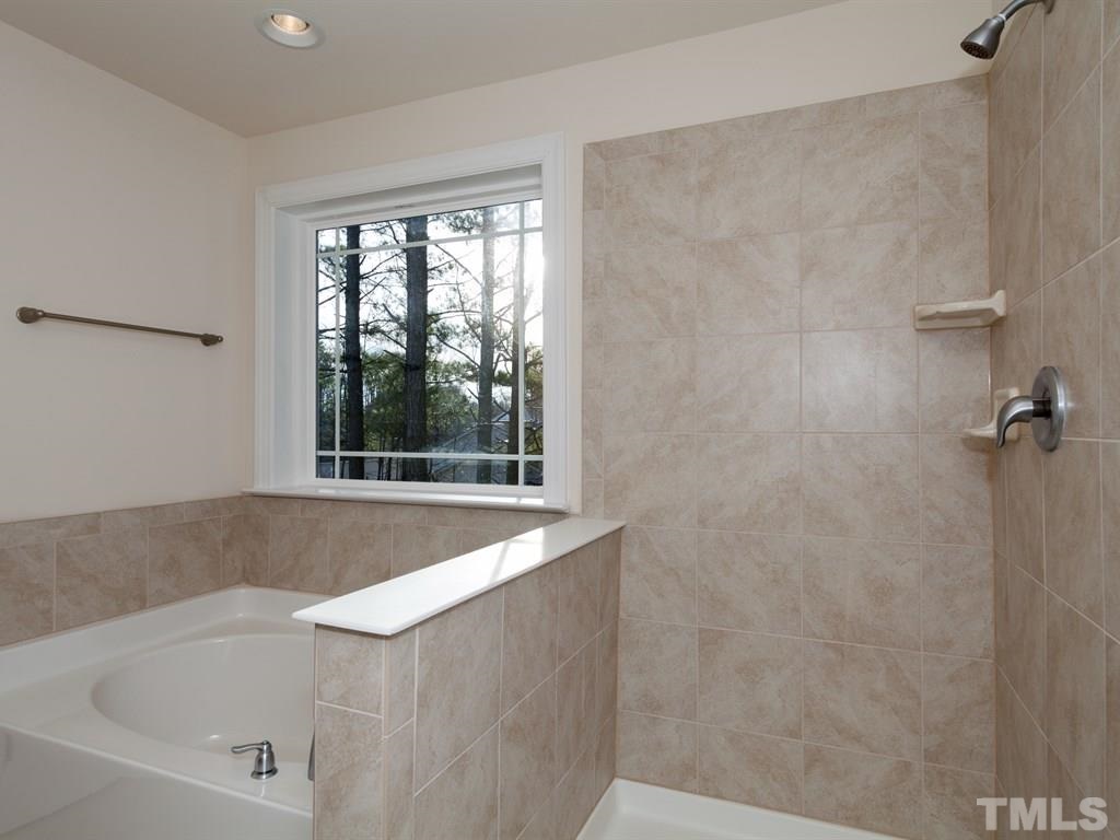 2424 Pecan Ridge Way Apex, NC 27502 - Photo 20 of 21 Seperate Tub and Shower is standard in the master bathroom! Not actual Home. Pictures are of same floorplan in community