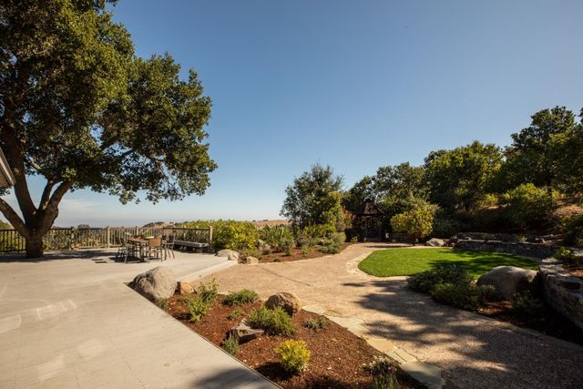 a view of roof with sitting area