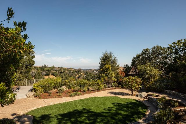 a view of yard with mountain