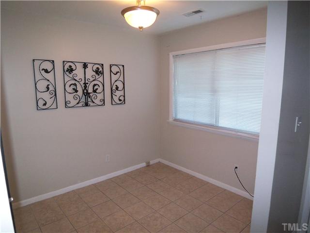 7300 Sandy Creek Drive Raleigh, NC 27615 - Photo 9 of 25 a view of a hallway