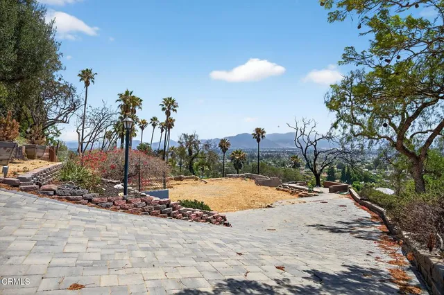 a view of a house with snow on the ground