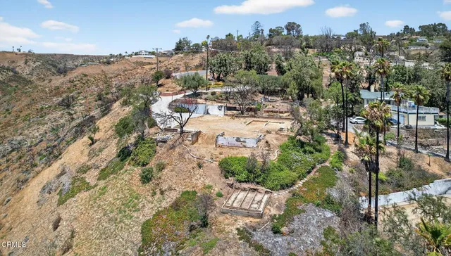a view of a backyard of a house