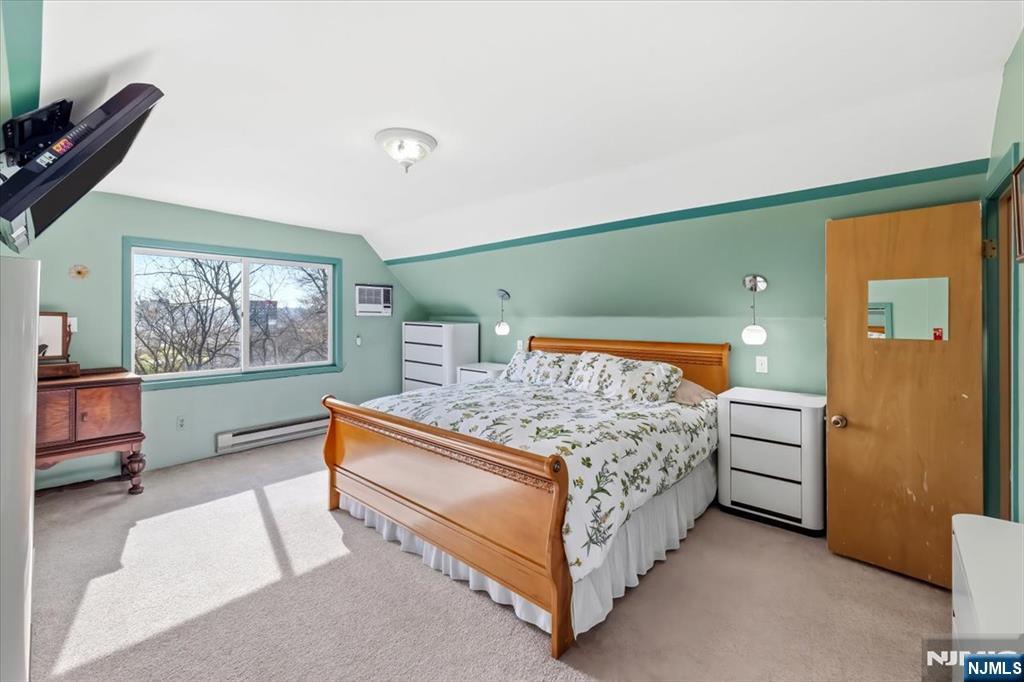 119 Overpeck Avenue Ridgefield Park, NJ 07660 - Photo 25 of 44 a bed room with a bed and a window