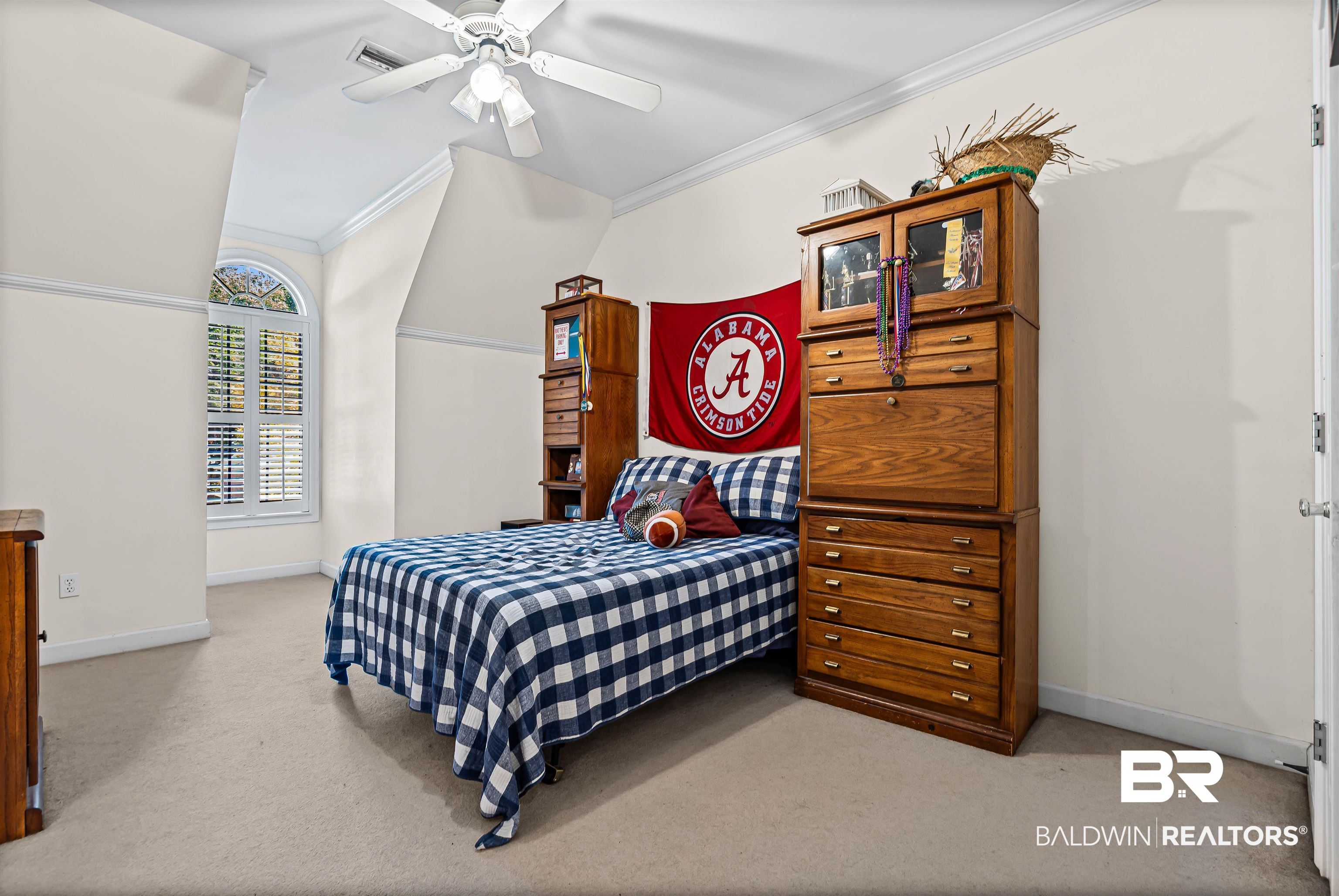 107 Beaver Dam Road Fairhope, AL 36532 - Photo 22 of 45 Bedroom featuring ornamental molding, light carpet, lofted ceiling, and ceiling fan