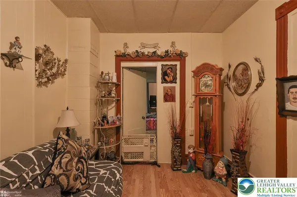 a view of walk in closet with clothes