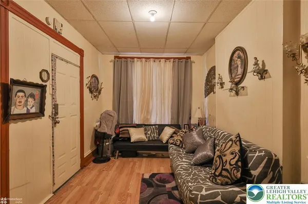 a kitchen with stainless steel appliances a refrigerator and a stove top oven
