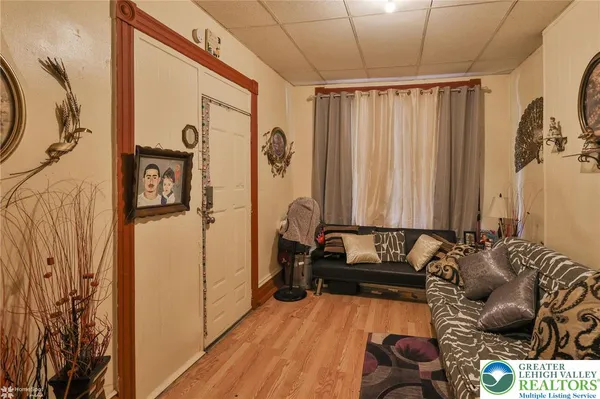 a bathroom with a shower and a window