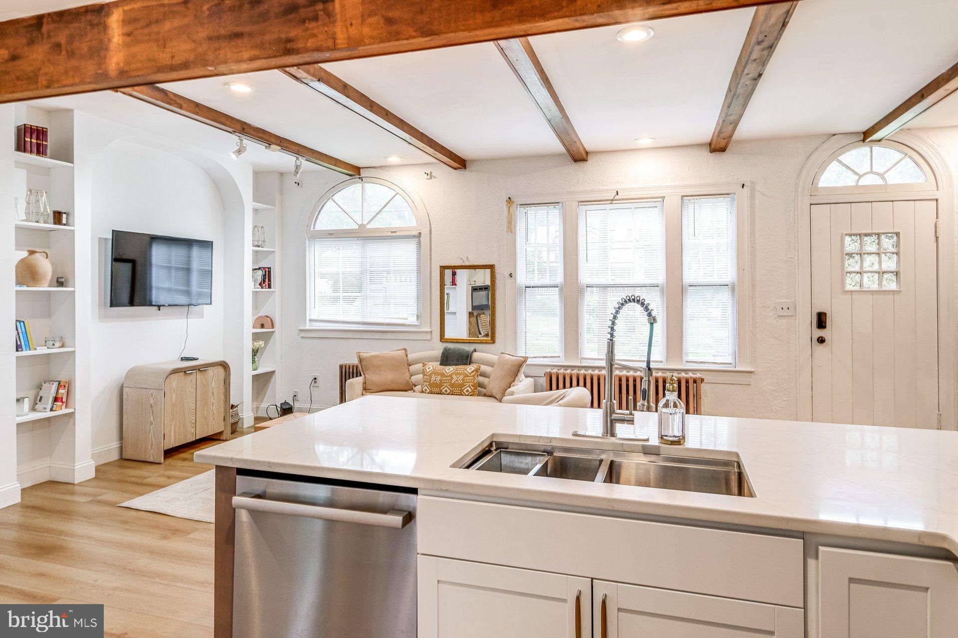 4209 Queensbury Road Hyattsville, MD 20781 - Photo 6 of 12 a view of a kitchen with a sink and a large window