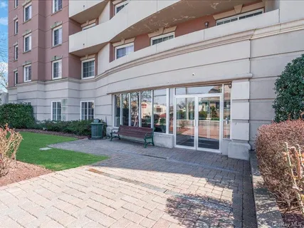 a view of a building with a yard