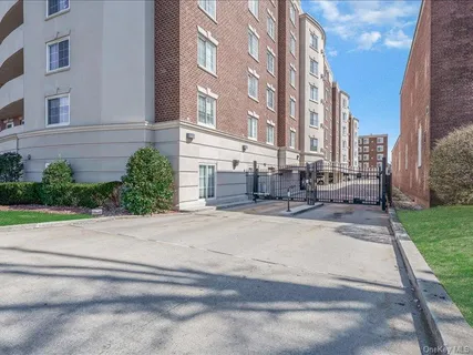 a front view of a building with garden