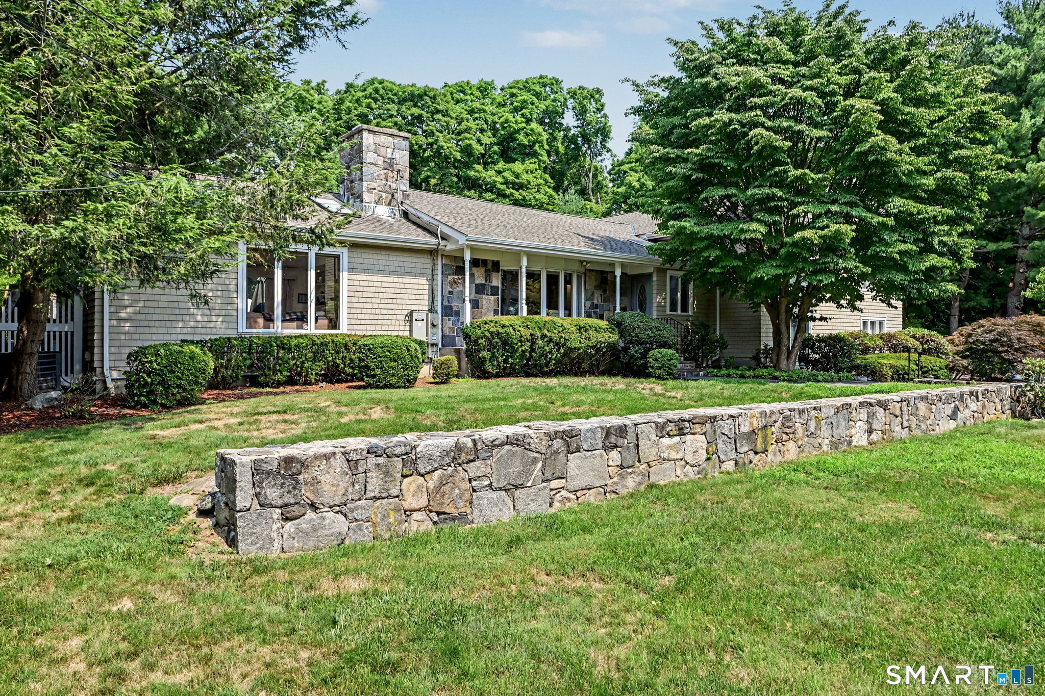 29 Old Logging Road Stamford, CT 06903 - Photo 34 of 38 Expansive front and back yards have limitless potential, nice stone walls and mature plantings