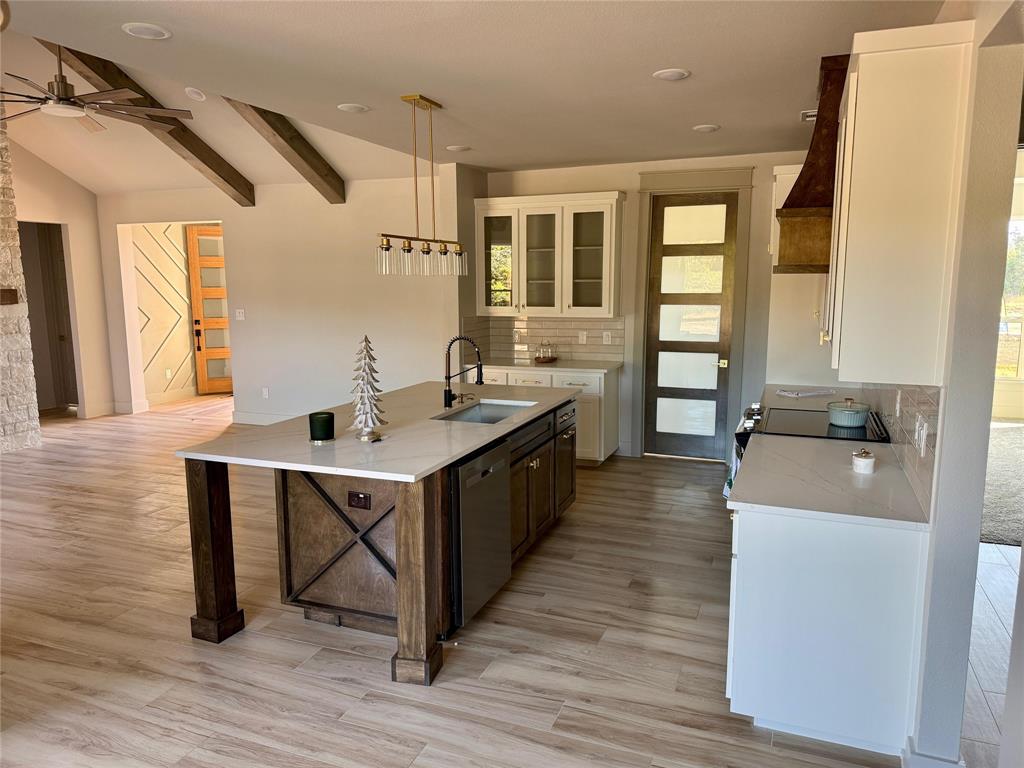 7805 Kenleigh Lane Rio Vista, TX 76093 - Photo 30 of 37 a kitchen with counter top space and sink