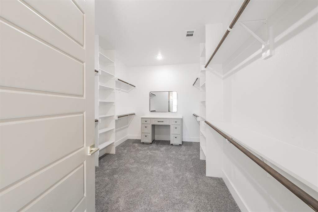 7805 Kenleigh Lane Rio Vista, TX 76093 - Photo 35 of 40 Walk in closet featuring dark carpet