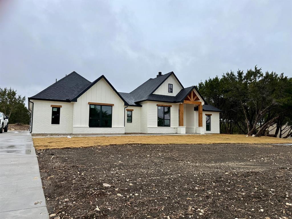 7805 Kenleigh Lane Rio Vista, TX 76093 - Photo 4 of 37 a front view of a house with a yard