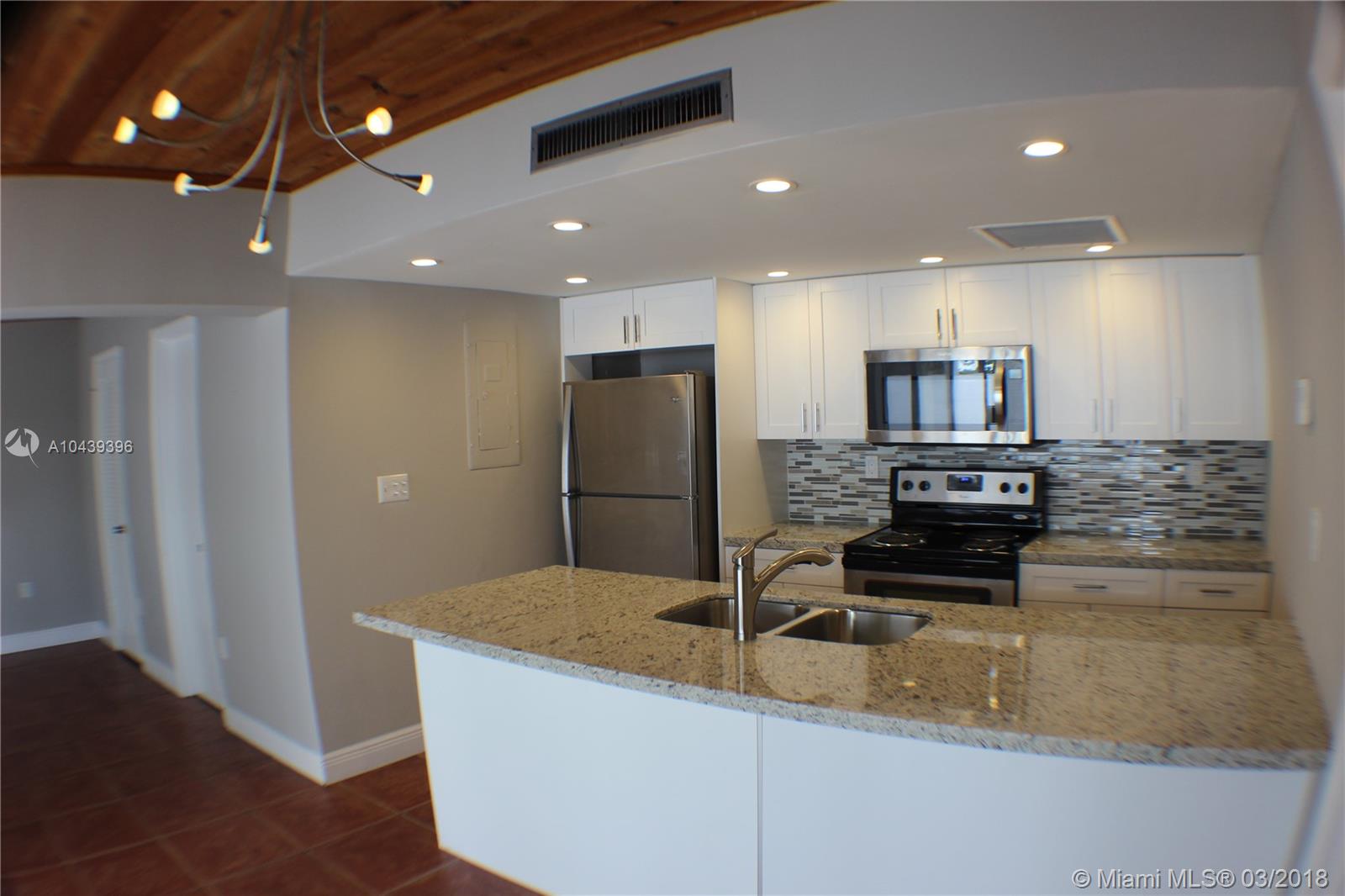 6356 Jack Rabbit Lane, Unit 6356 Miami Lakes, FL 33014 - Photo 7 of 13 Kitchen side view