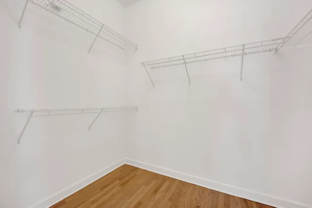 a view of empty room with windows