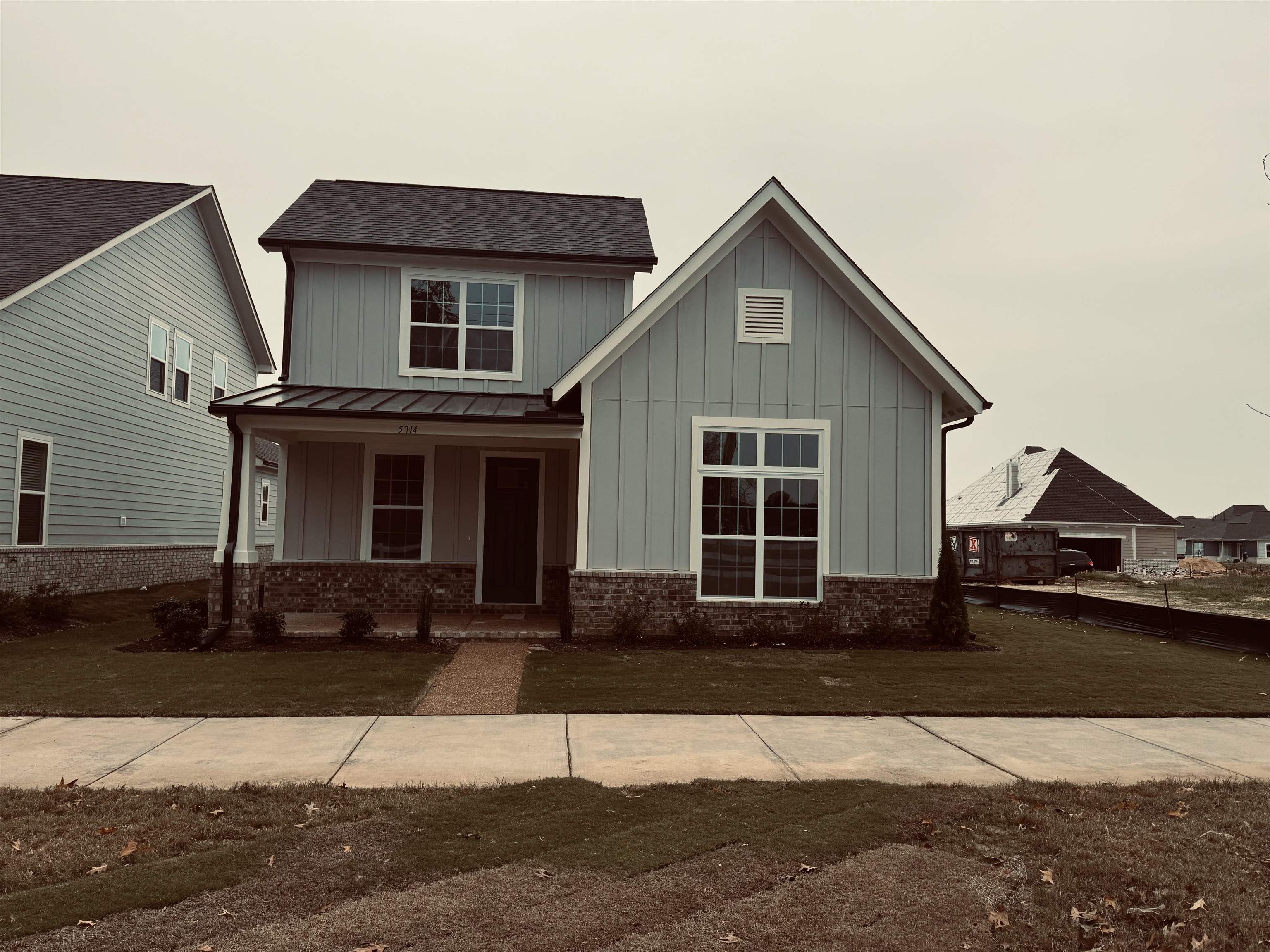 Craftsman inspired home featuring a porch