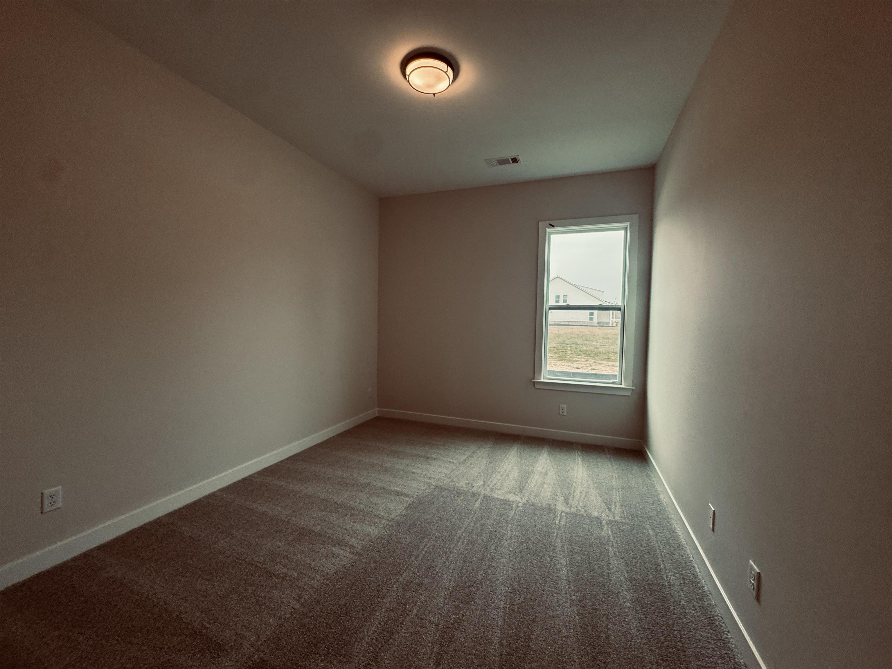 5714 Gerber Road Arlington, TN 38002 - Photo 10 of 19 Unfurnished room with carpet floors