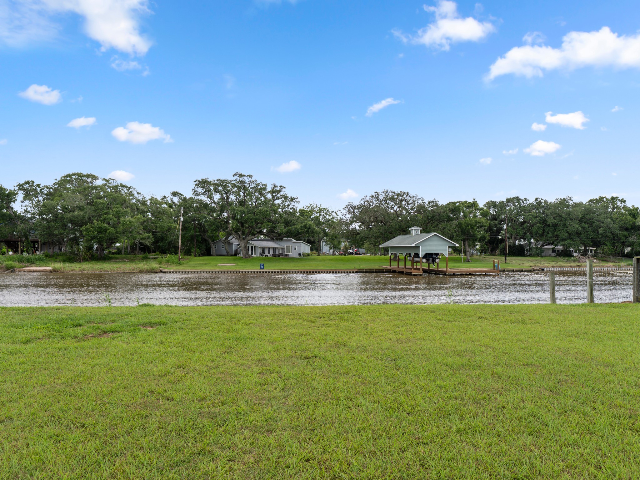 7 County Road 291 Sargent, TX 77414 - Photo 15 of 19 a view of a swimming pool and a yard
