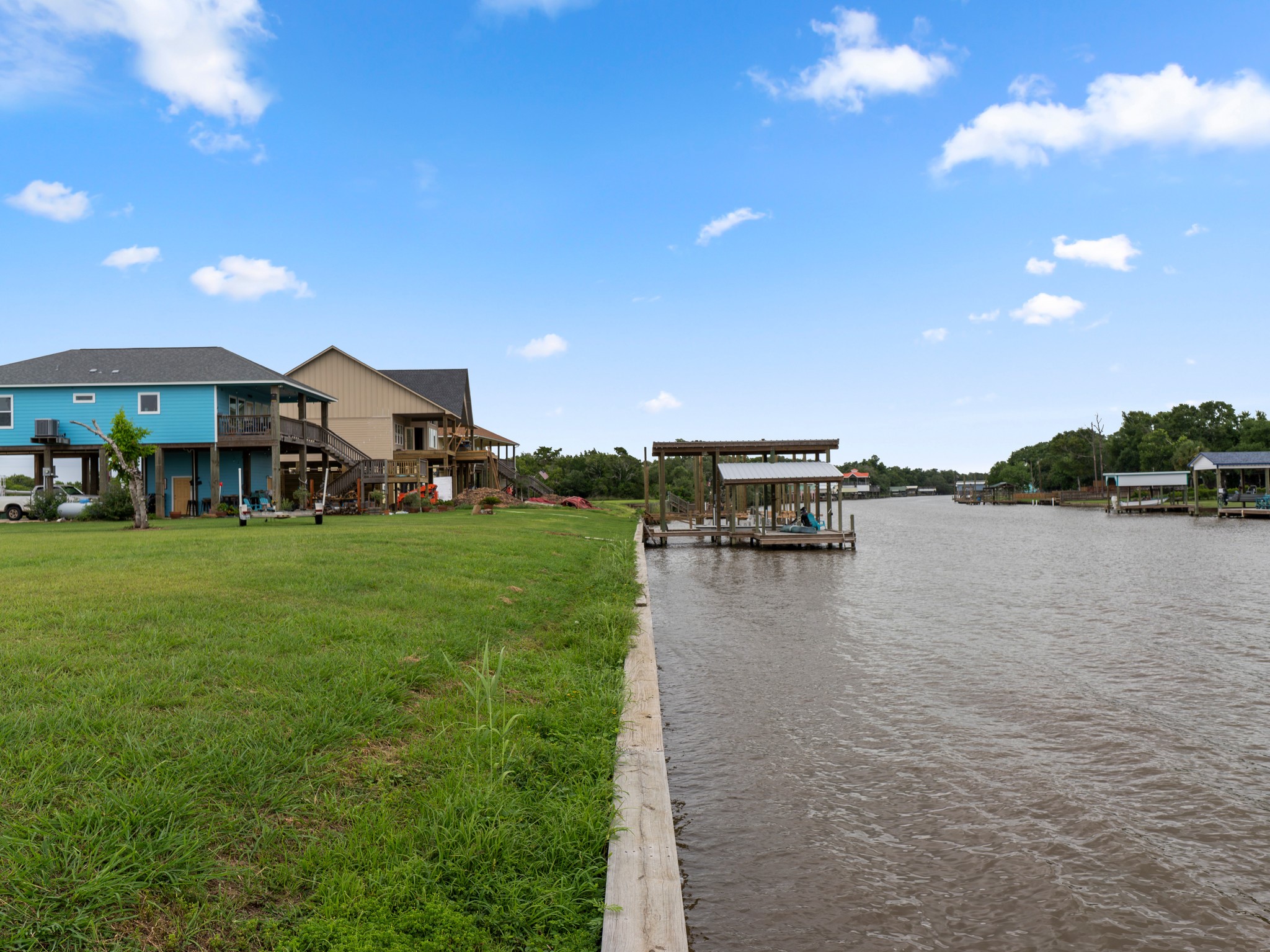 7 County Road 291 Sargent, TX 77414 - Photo 17 of 19 a view of a lake with outdoor space