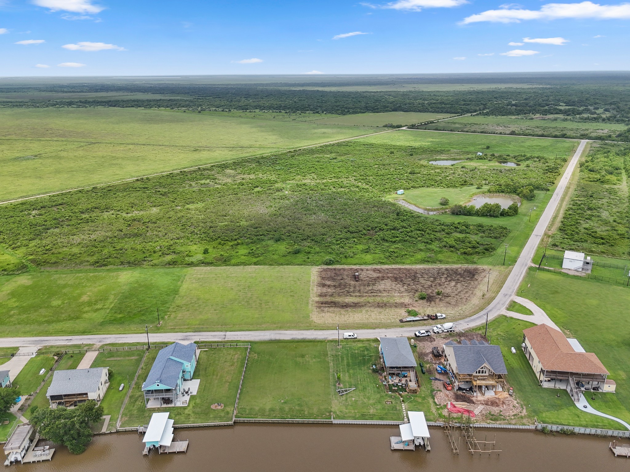 7 County Road 291 Sargent, TX 77414 - Photo 7 of 19 a view of a swimming pool and an outdoor space