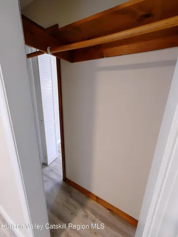 a bathroom with a tub and a shower