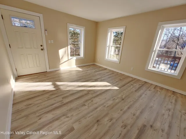 a view of livingroom with hardwood floor and window