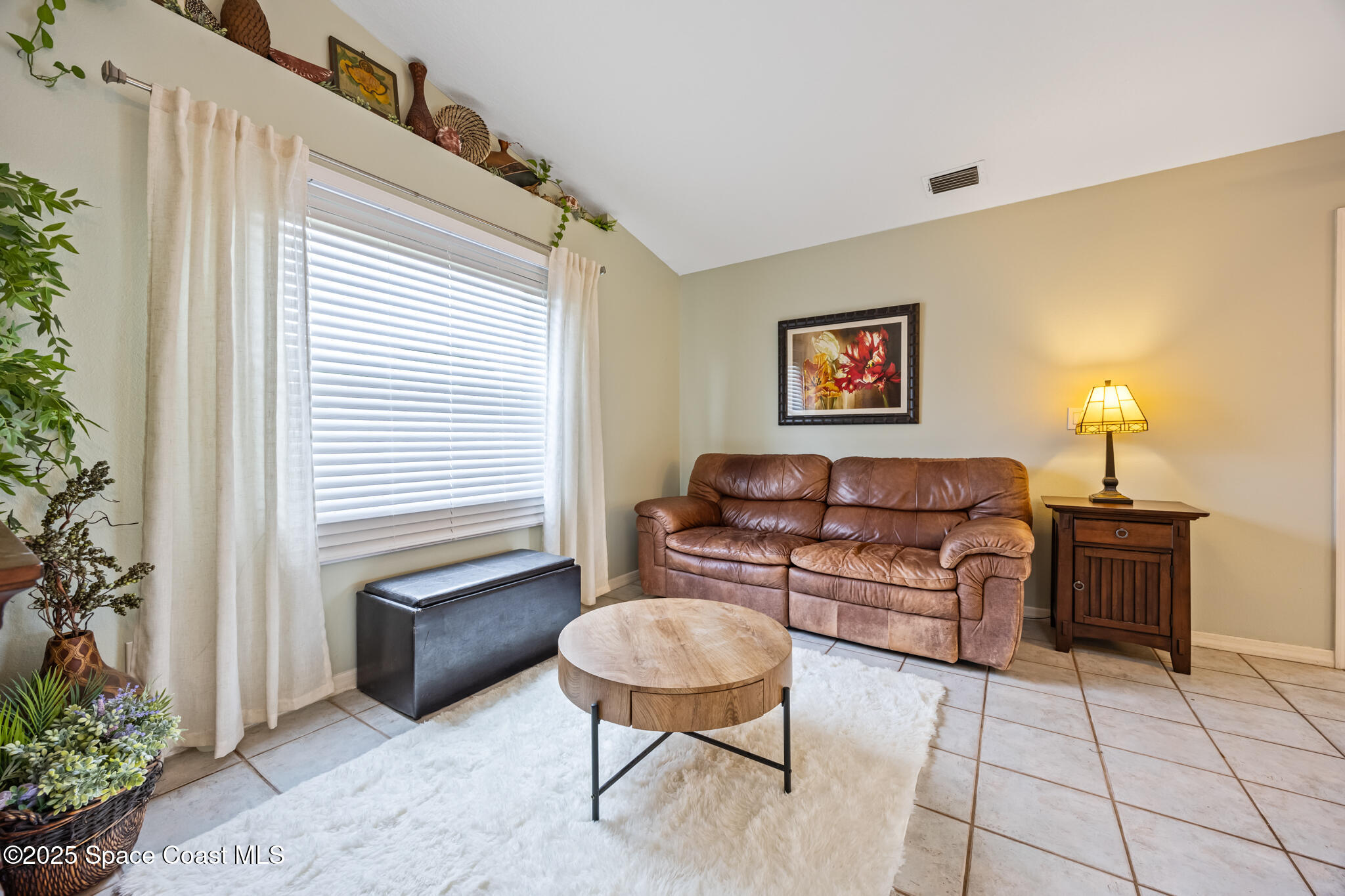1252 Winding Meadows Road Rockledge, FL 32955 - Photo 17 of 32 a living room with furniture