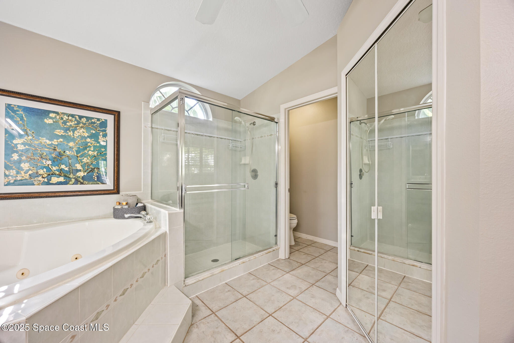 1252 Winding Meadows Road Rockledge, FL 32955 - Photo 23 of 32 a spacious bathroom with a shower and a bathtub