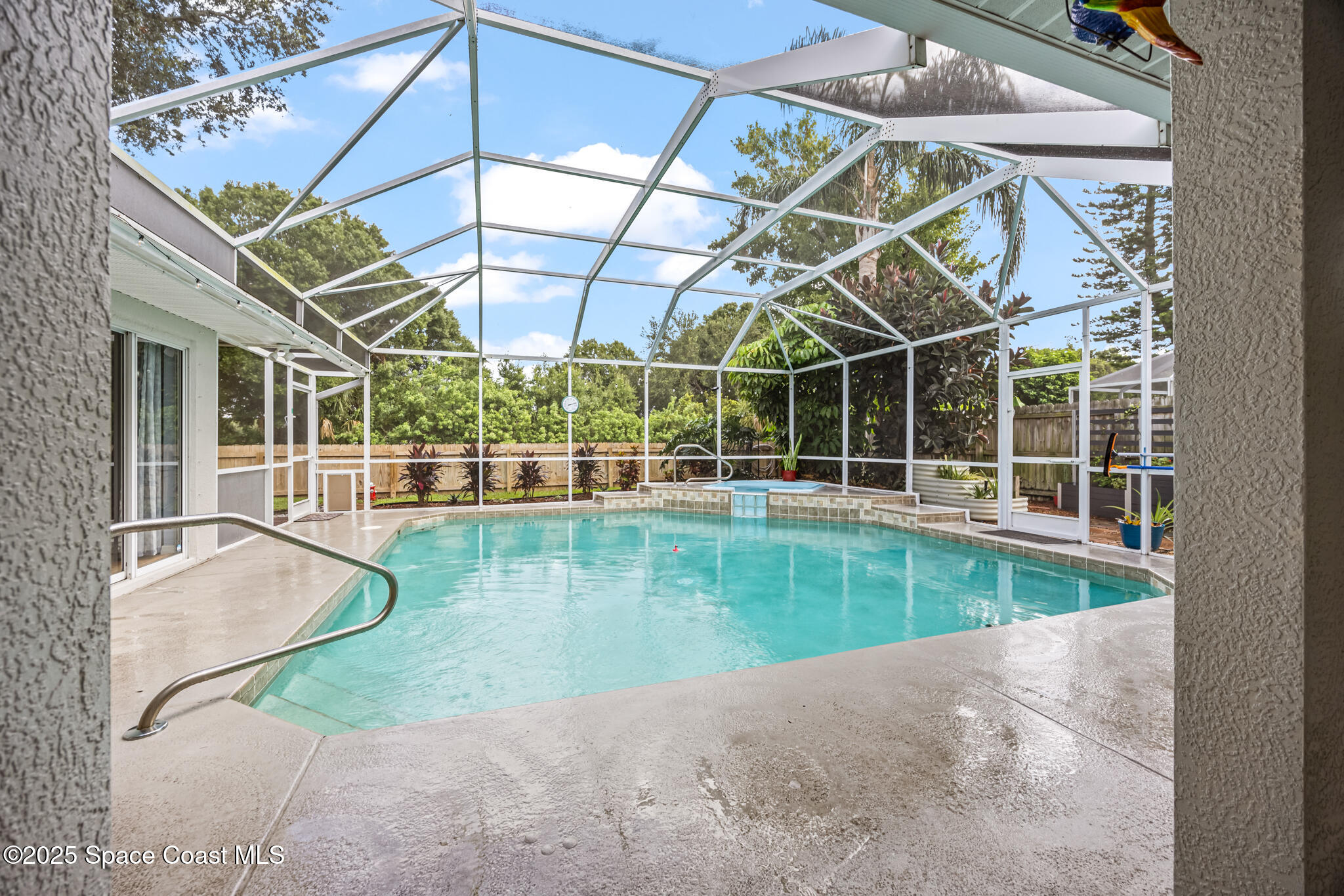 1252 Winding Meadows Road Rockledge, FL 32955 - Photo 30 of 32 a view of a swimming pool with a yard