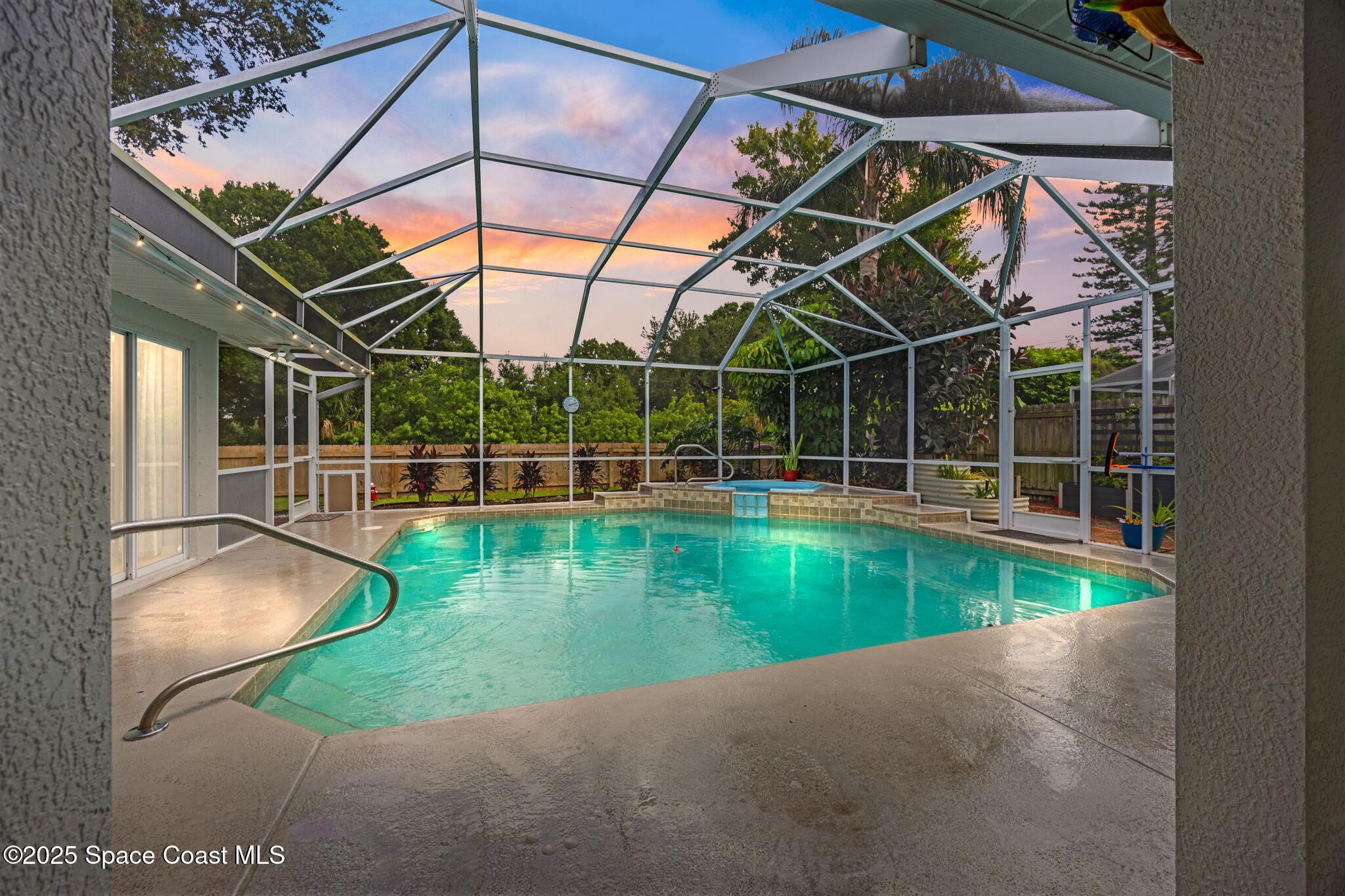 1252 Winding Meadows Road Rockledge, FL 32955 - Photo 3 of 32 a view of a backyard with a swimming pool