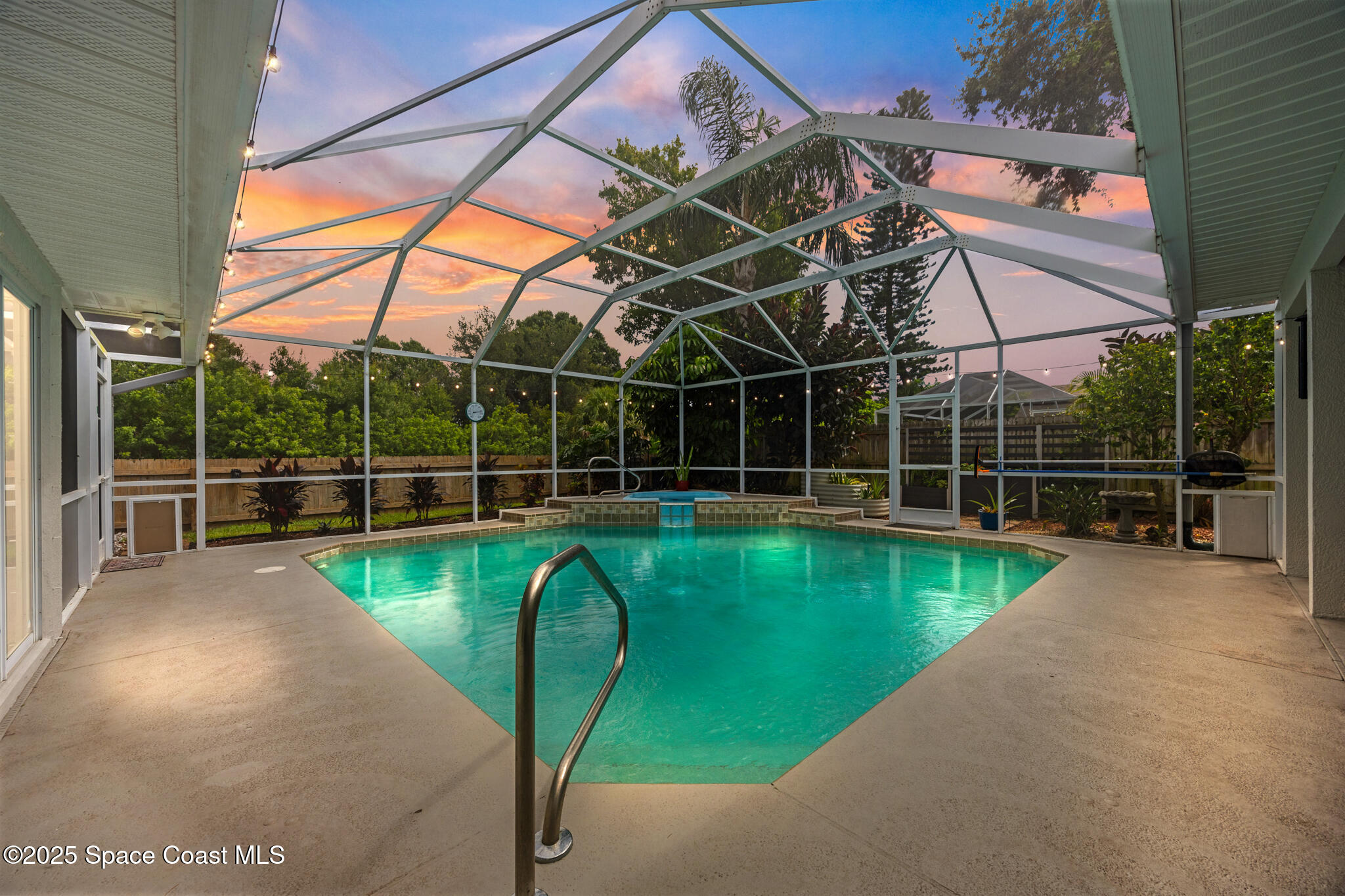 1252 Winding Meadows Road Rockledge, FL 32955 - Photo 4 of 32 a view of a swimming pool with a porch