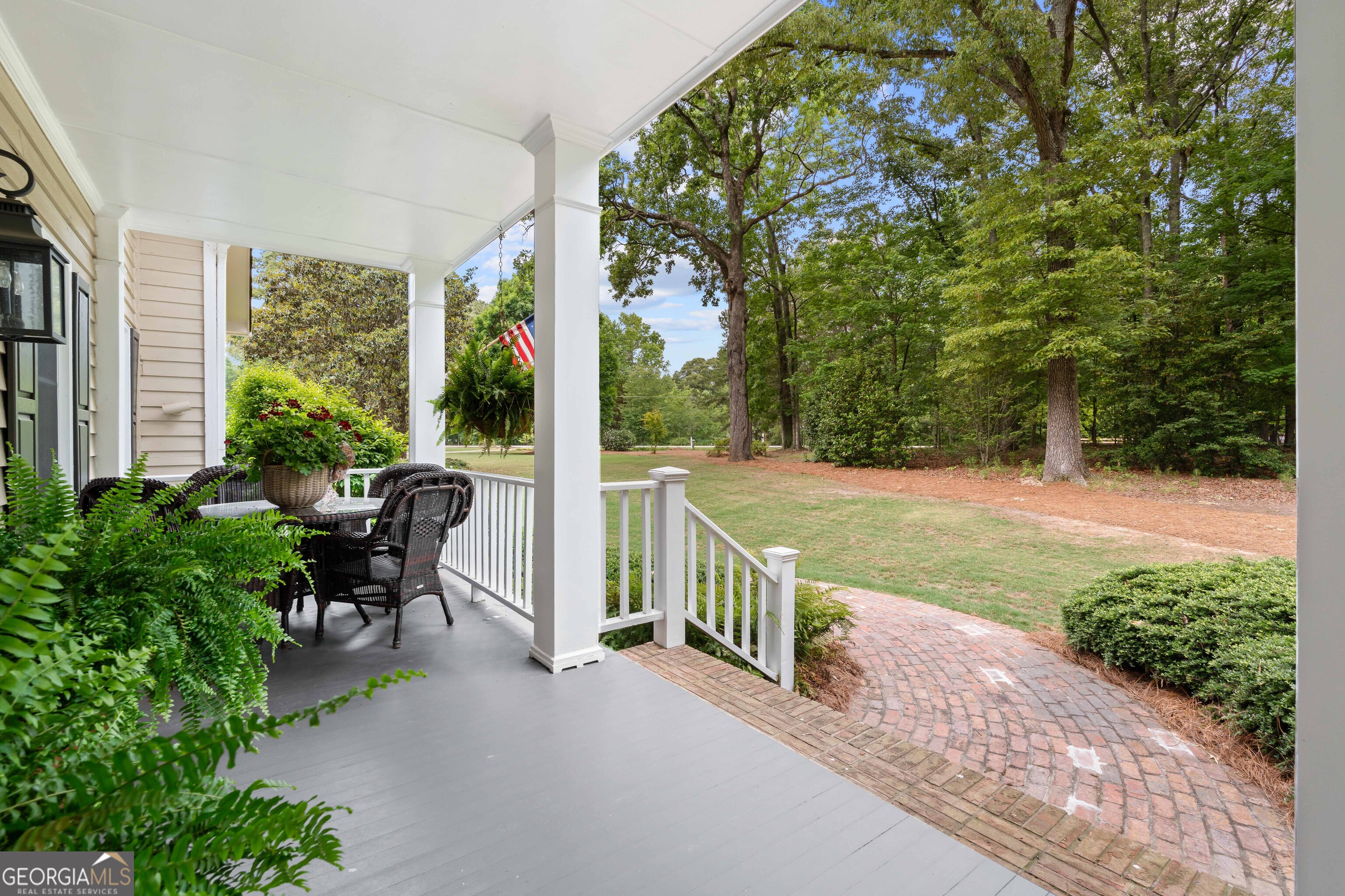 836 Oak Grove Road Carrollton, GA 30117 - Photo 9 of 50 a view of a two chair and table in the patio