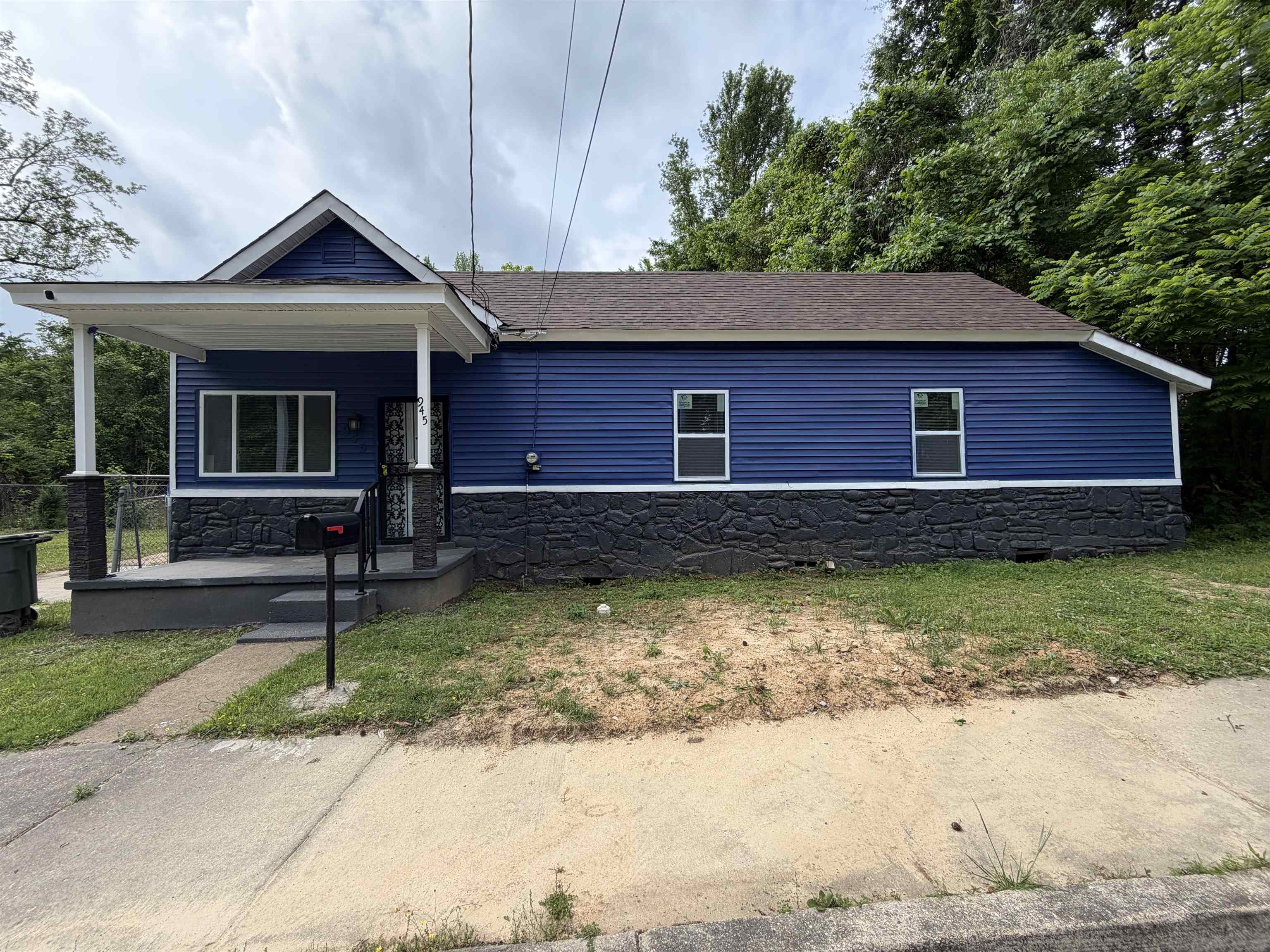 945 Nora Road Memphis, TN 38109 - Photo 23 of 27 a view of a house with a yard