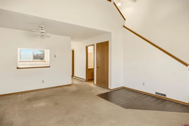 an empty room with windows