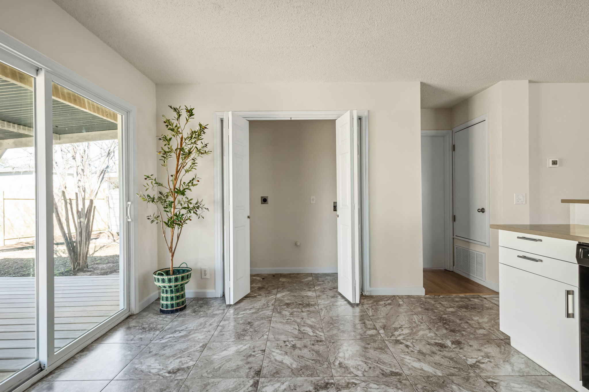 161 Segovia Way Pflugerville, TX 78660 - Photo 14 of 37 a view of a hallway to rooms and livingroom with furniture