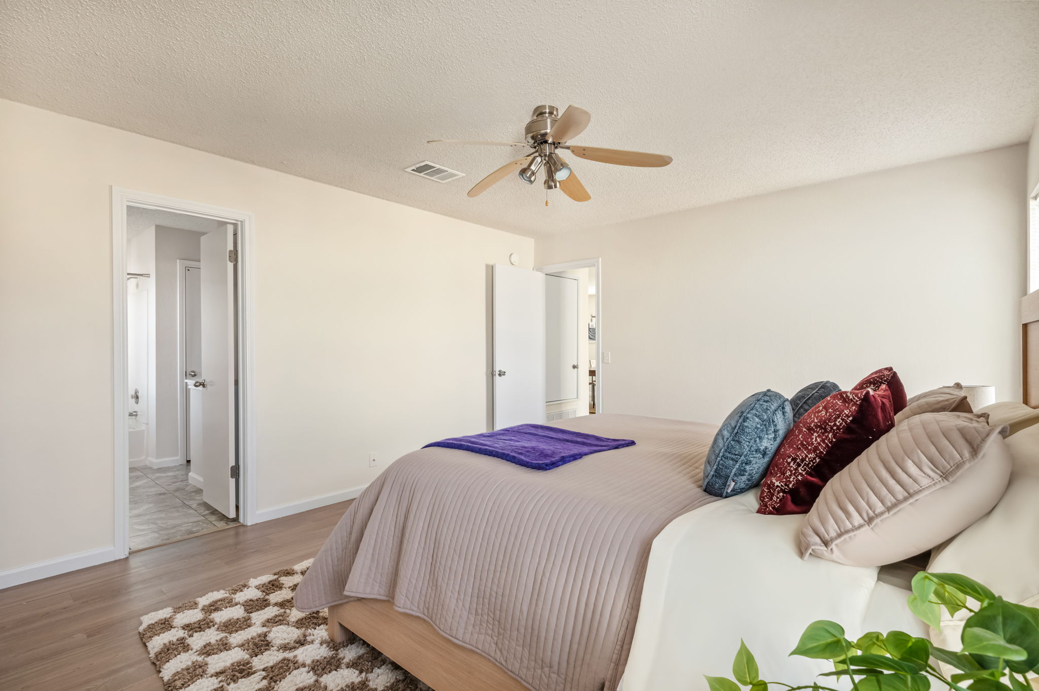 161 Segovia Way Pflugerville, TX 78660 - Photo 17 of 37 a bedroom with a bed and wooden floor