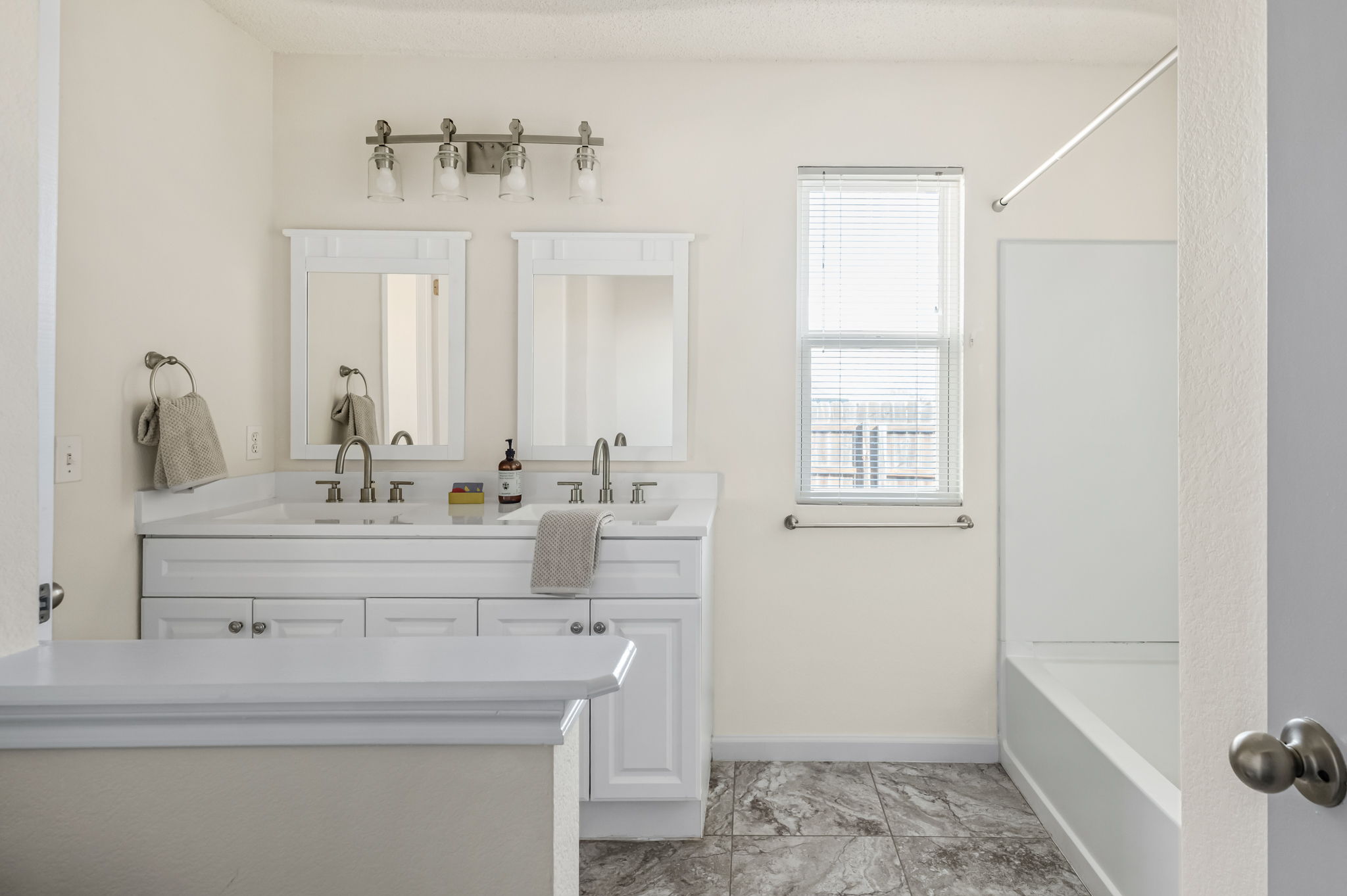 161 Segovia Way Pflugerville, TX 78660 - Photo 21 of 37 a bathroom with a sink and a mirror