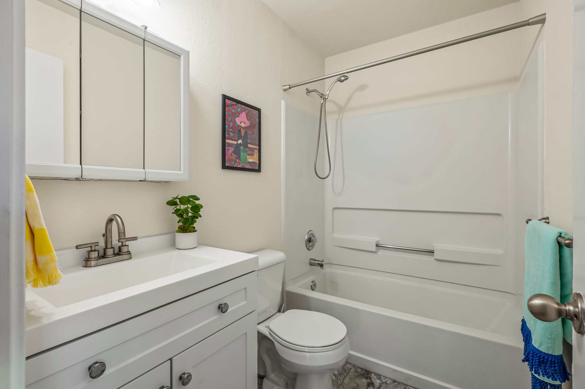 161 Segovia Way Pflugerville, TX 78660 - Photo 26 of 37 a bathroom with a sink a toilet and shower